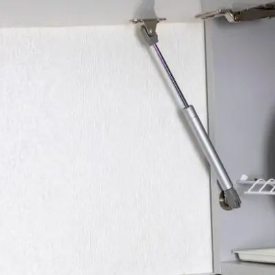 soft-close drawers and under-cabinet lighting in factory modular kitchen